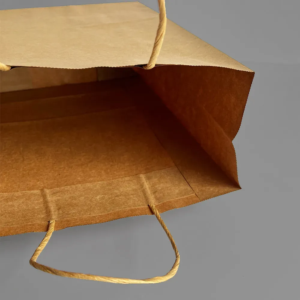 beg coklat dengan pemegang pukal